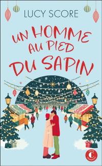 Un homme au pied du sapin